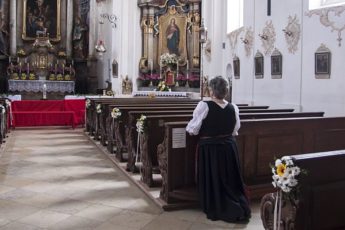 women praying in church