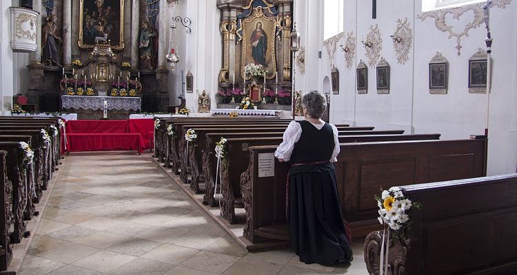 women praying in church